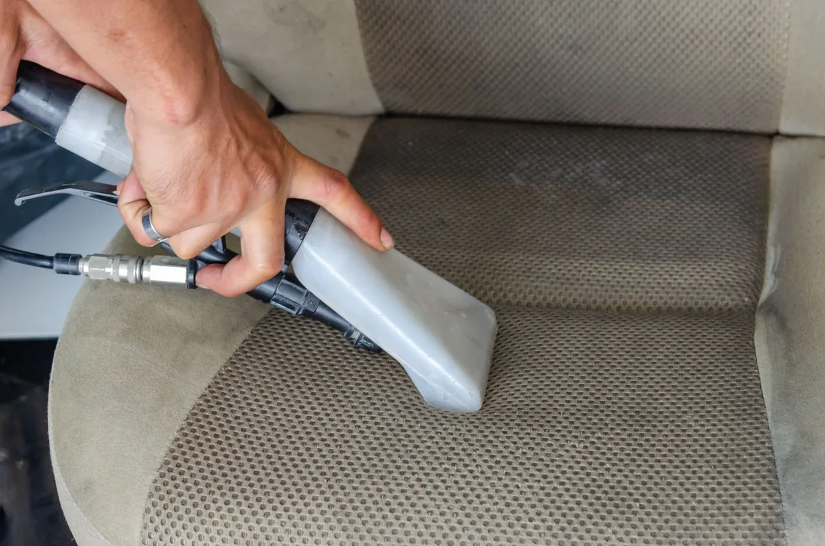 Under Car Seat Vacuuming