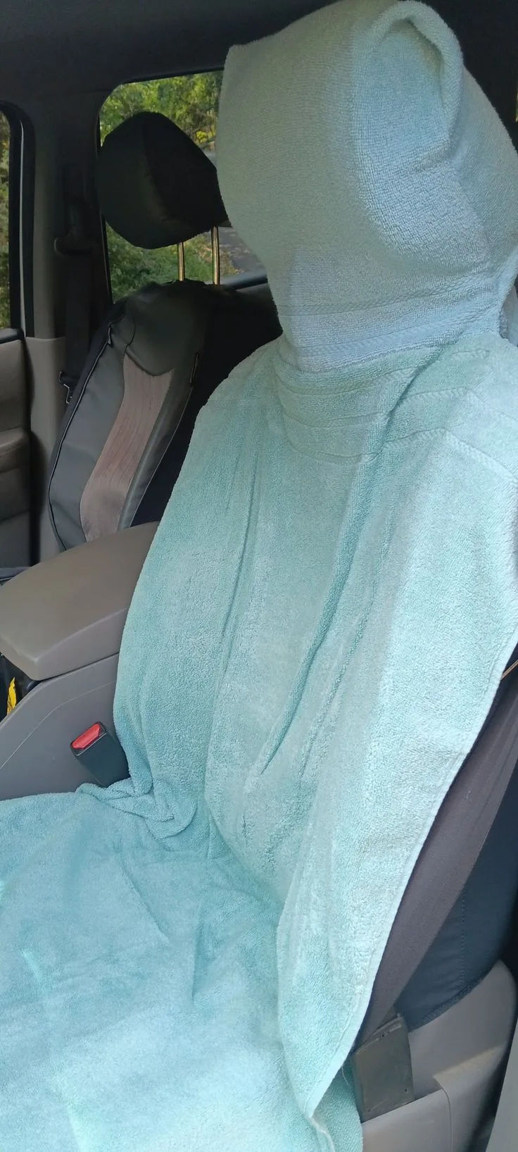 blotting wet car seat