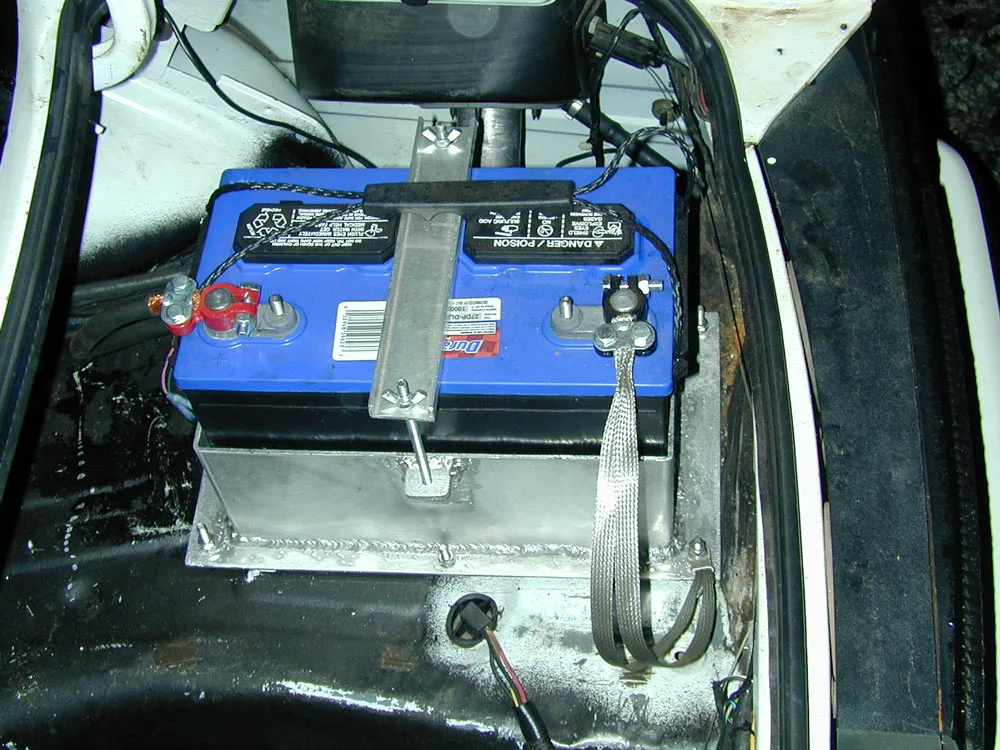 trunk-mounted car battery
