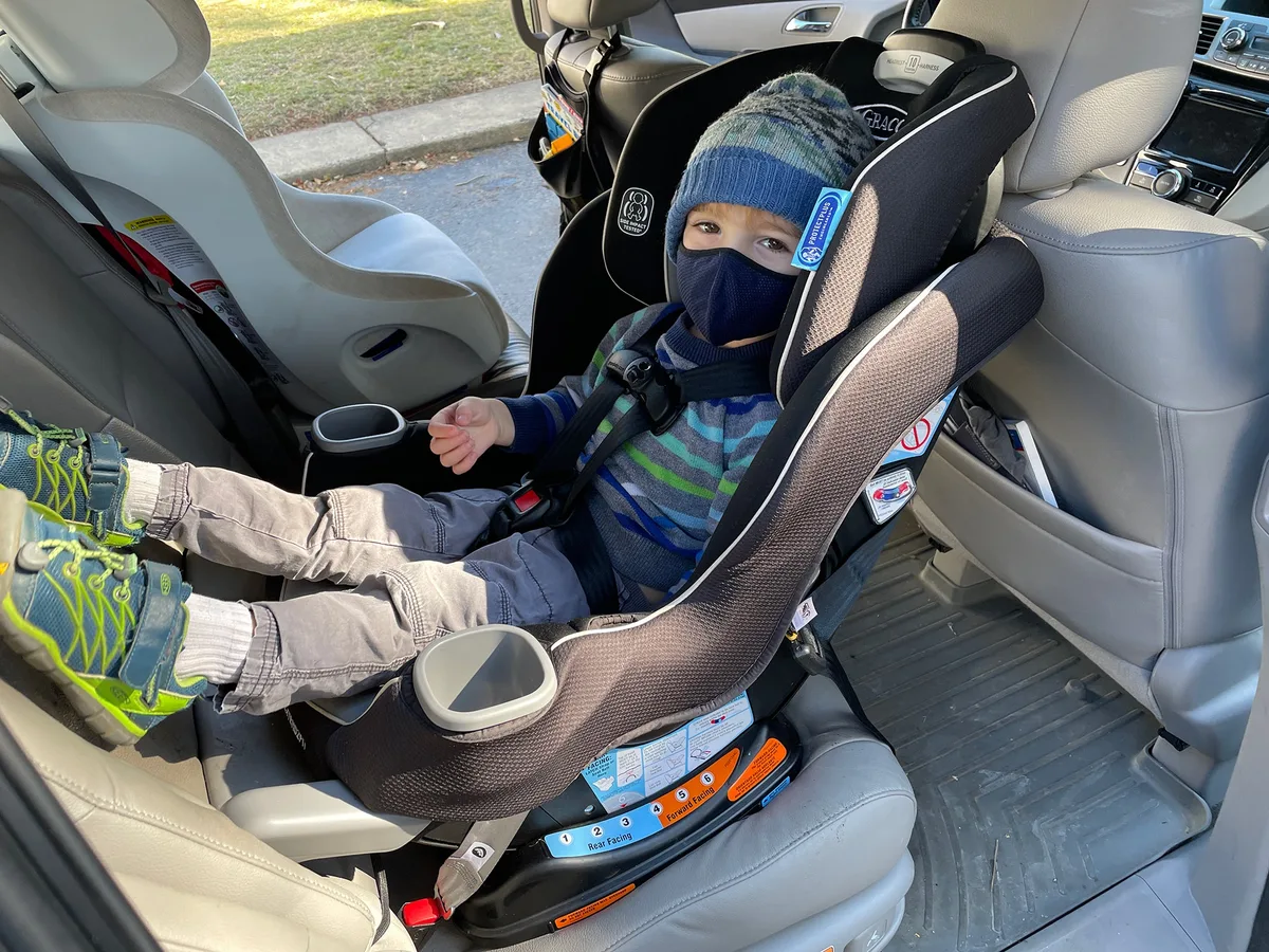 where should shoulder straps be on car seat